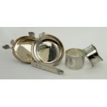 Mixed lot of silver comprising two foreign silver pin dishes, two napkin rings and one silver pen