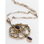 Amethyst and Seed Pearl Art Deco style pendant on a fine chain tests as 9ct weight 4.9g