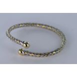 14ct White and yellow Gold sprung Torc bangle weight 21g