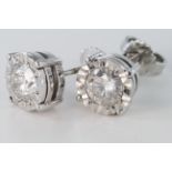 Pair of 18ct white gold Diamond Earrings approx 1.50ct weight with screw back posts