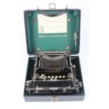 Corona black folding typewriter, contained in original case, label inside lid dated '10th