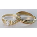 Two 14ct Gold Rings (Russian wedding Ring and White sapphire set) weight 4.3g