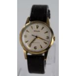Gents 9ct cased Rolex wristwatch, the case hallmarked Edinburgh 1959. The cream dial with gilt baton