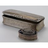 Two silver snuff / pill boxes, larger box hallmarked 'A.T, Birmingham 1856', smaller box stamped '