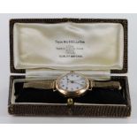 Gents mid size 9ct cased wristwatch by Thomas Russell, import marks for Glasgow 1935. On 9ct