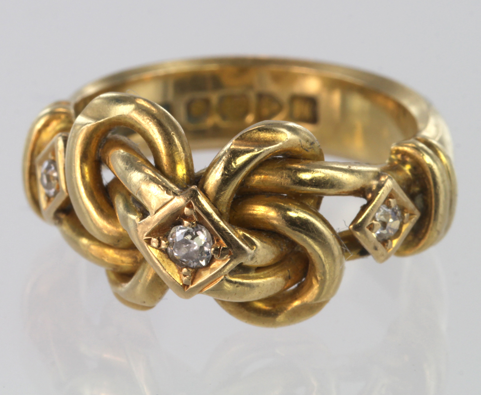 18ct Gold Diamond set Knot Ring size M weight 9.7g