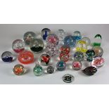 Paperweights. A collection of twenty-eight mostly paperweights, makers include Caithness, Robert
