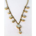 9ct gold fine chain set with ten pendant set Opals weight 6.9g