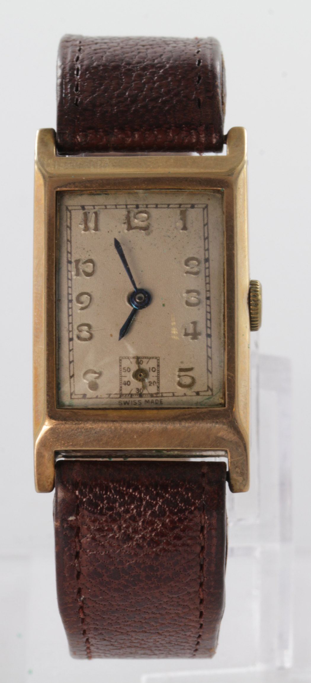 Gents 9ct Gold Swiss wristwatch, on a brown leather strap, dial 23mm x 17mm (working at time of