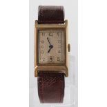 Gents 9ct Gold Swiss wristwatch, on a brown leather strap, dial 23mm x 17mm (working at time of