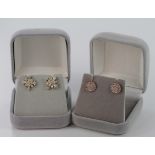 Boxed pair of ladies 9ct rose gold / diamond earrings along with a boxed pair of 9ct gold / diamonds