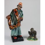 Two Royal Doulton figures, comprising 'The Carpet Seller H.N. 1464' & 'Gollum H.N. 2913', height