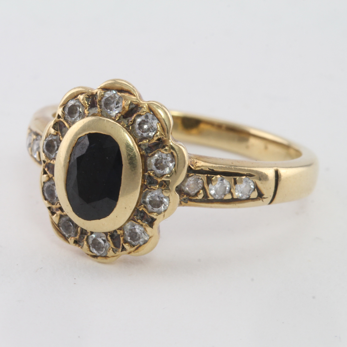 14ct Gold Ring set with Sapphire/CZ size M weight 4.5g