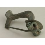 Ancient Roman (ca. 200 AD) bronze knee type fibula; nice patina and details.