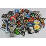 Car badges. A collection of approximately forty-five car badges, including numerous veteran motorist