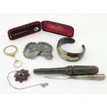 Jewelery etc. A collection of items, comprising a gilded lorgnette; Victorian gold & garnet pendant;