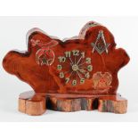 Masonic interest. A decorative wood mantle clock with several symbols, including Masonic, by E. N.