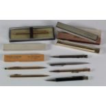 Thirteen pencils, including silver and rolled gold examples (some engraved)