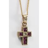 9ct Gold Ruby set Cross on a fine Chain weight 2.0g