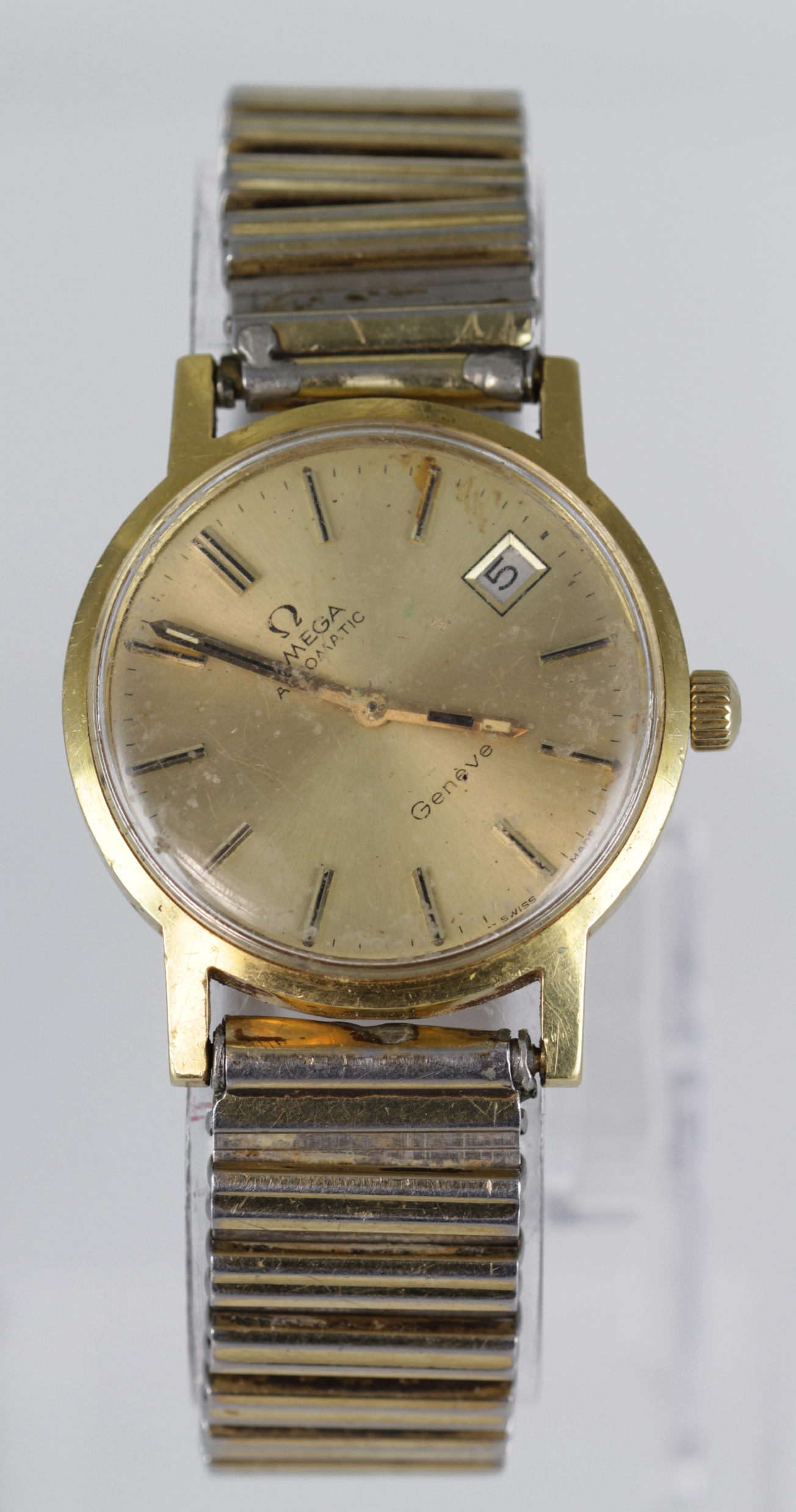 Gents 18ct cased Omega Automatic Geneve, circa 1974 (serial number 38212333). Dial has rotated