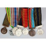 Africa - Zimbabwe: A collection of 7 assorted miniature medals NEF