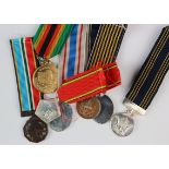 Africa - Zimbabwe: A collection of 7 assorted miniature medals NEF