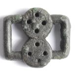 Ancient British, Celtic, strap junction, two joined solid rings with punch decoration with