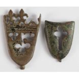 Mediaeval sword chapes in bronze, both pierced one looks to have been black enamelled with a