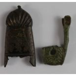 Mediaeval sword chapes in bronze, one once decorated in green and gold, 55mm., the other c.44mm. [