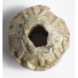 Anglo-Saxon lead spindle whorl with 'runic' letters each side, c.30mm.