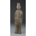 Tang Guardian Figure, C. 618 - 917 A.D. Tang Guardian Figure with belted robe and soft hat. Some red