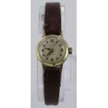 Ladies 14ct cased wristwatch by L.A Leuba. on a leather strap, engraved on back "Weihnachten