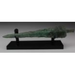 Greek Dagger with Ribbed Section, C. 1000 B.C. Greek Bronze Age. Cast bronze blade with integral