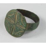 Crusaders Seal Ring with Cross, ca. 1200 AD, oval band with applied large bezel depicting a cross.