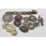 Mixed lot of silver items, which includes medals (6) coin bracelets (2) one is silver plate,