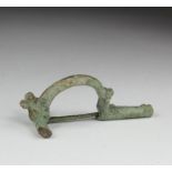 Roman Legionary Bow Brooch, ca. 200 - 300 AD. Intact with restored pin and nice ancient patina. 59