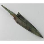 Bronze Age Spearhead , C. 1200 - 800 B.C. Cast bronze spearhead with integral midrib and tang.