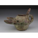 Seljuk Dynasty Oil Lamp, C. 1037 - 1194 A.D. Seljuk Glazed Earthenware Oil lamp with three spouts,