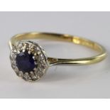 18ct sapphire and diamond cluster ring, size N, weight 1.7g.