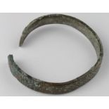 Viking Dragon headed Bracelet, ca. 900 AD, cast solid body with decoration and terminals shaped as
