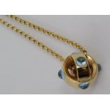 18ct yellow gold Georg Jensen slider pendant set with cabochon aquamarine stones on fine belcher