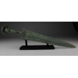 Bronze Age Sword with Handle, C. 1200 - 800 B.C. Western Asiatic, Luristan. Cast bronze blade with