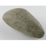 Prehistoric Stone Axehead, C. 10,000 B.C. Polished stone axehead with narrow butt. Complete in