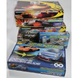 Scalextric. Four Scalextric boxed sets, comprising Bash n Crash; Rally Challenge; Super Saloons;