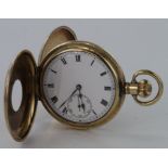 Gents gold plated half hunter pocket watch in the Dennison "Moon" case, the white 43mm dial with