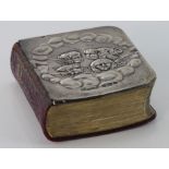 A silver covered prayer book, hallmarked Birmingham 1904