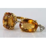 18ct gold imperial topaz and diamond ring, size P, weight 5.2g. 18ct gold matching pendant, weight