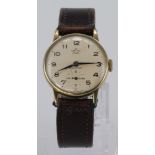 Gents 9ct cased Smiths "De Luxe" mechanical wrist watch on leather strap, watch not working when