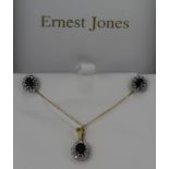 18ct gold set comprising sapphire and diamond cluster pendant on fine curb chain, and matching