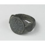 Ancient Roman Legionary Ring , C. 200 AD. Bronze Ring with inscribed decoration of star on bezel and